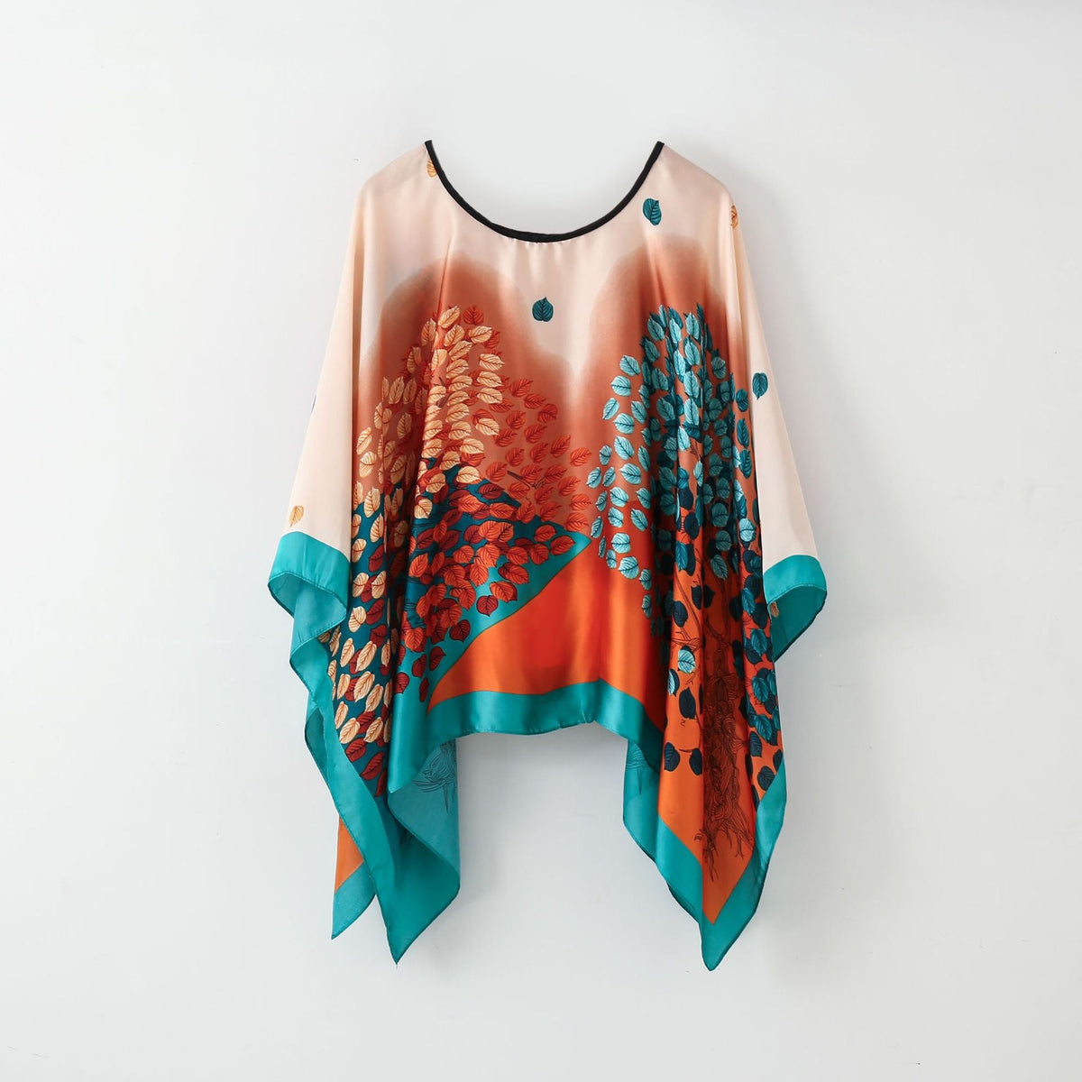Peach-and-teal floral poncho-style pullover shawl scarf with black neckline