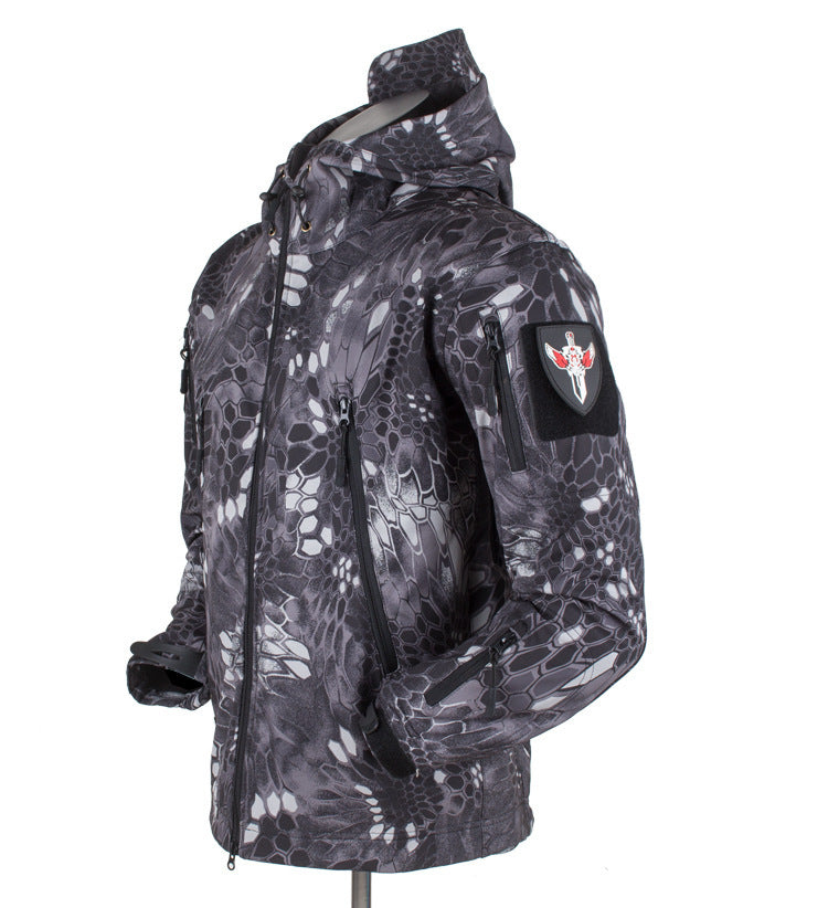 Three-in-one shell jacket, dark camo print, hooded zip-up with side pockets.