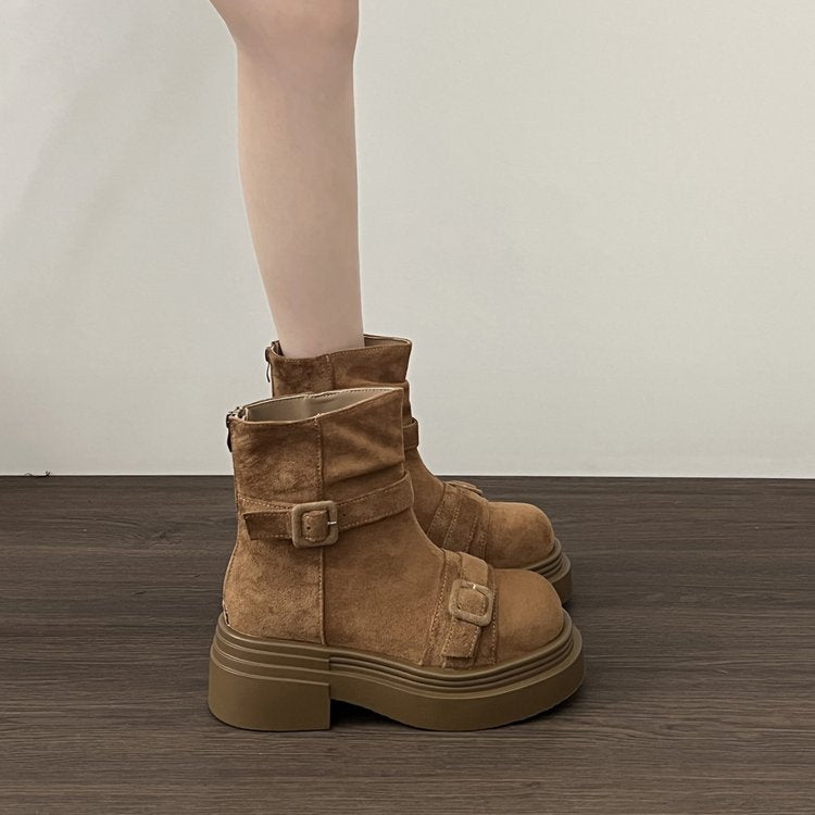 Brown suede ankle platform boots with two buckle straps and low shaft