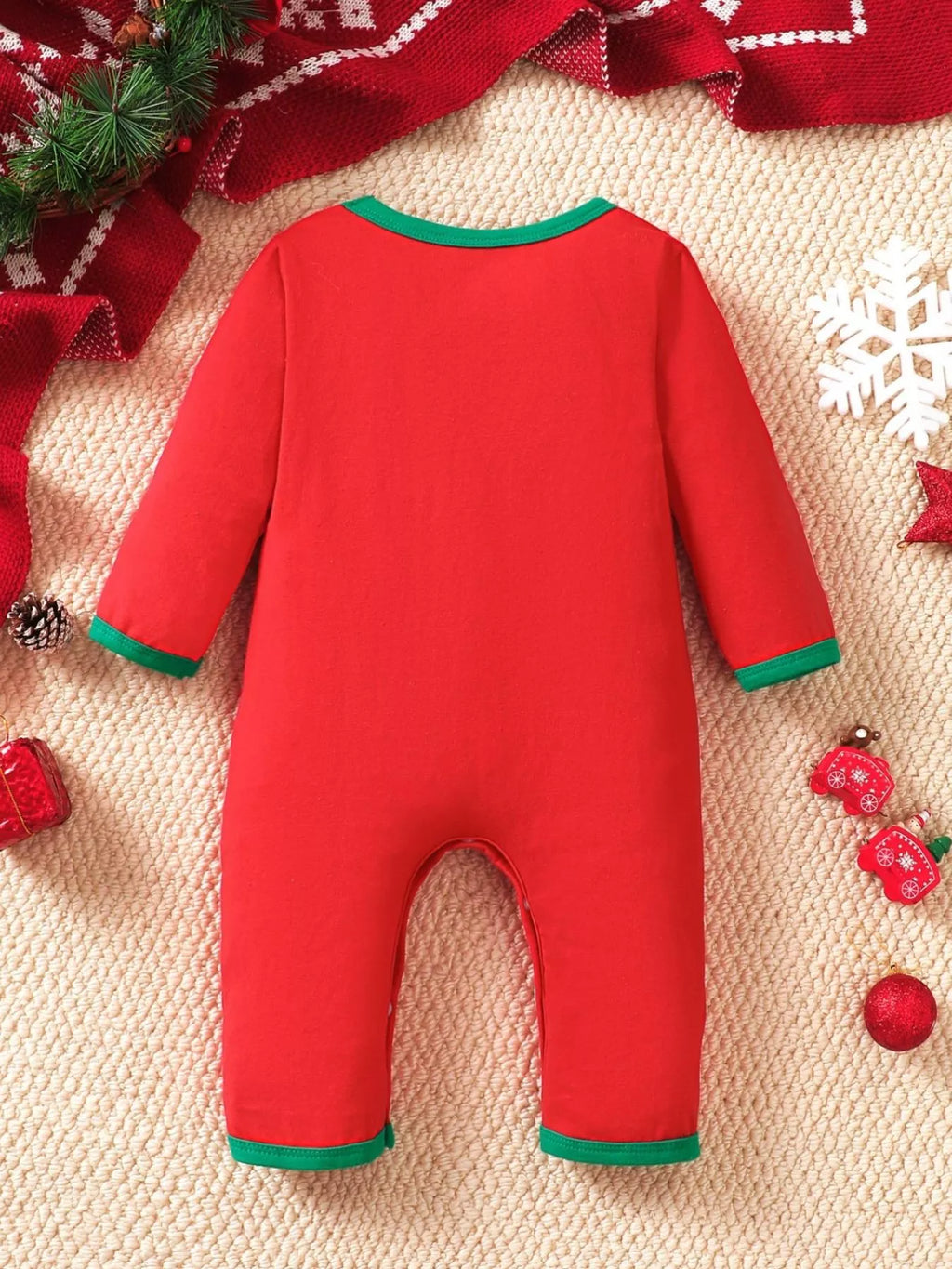 Red kids Christmas theme jumpsuit with green-trim cuffs and snap-leg buttons
