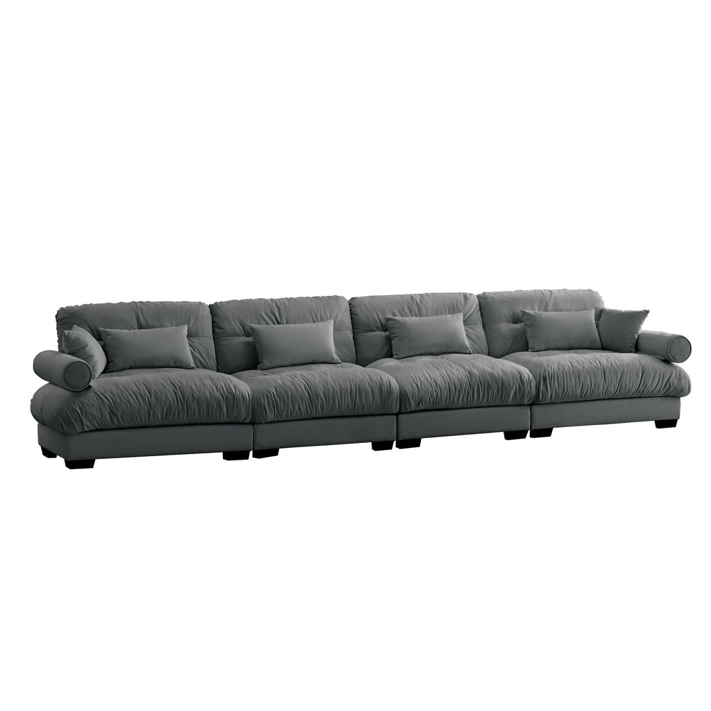 Dark gray modular sectional sofa with deep seat, rolled arms, and removable-looking sections