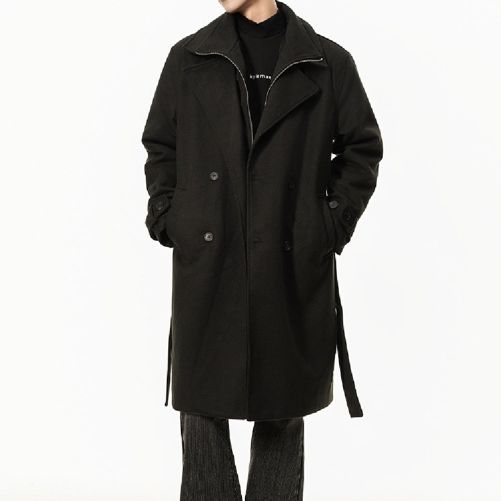 Black double-breasted long trench coat with notched lapels and buttoned cuffs