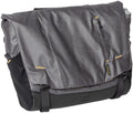 Black nylon messenger bag with front flap and zip pocket
