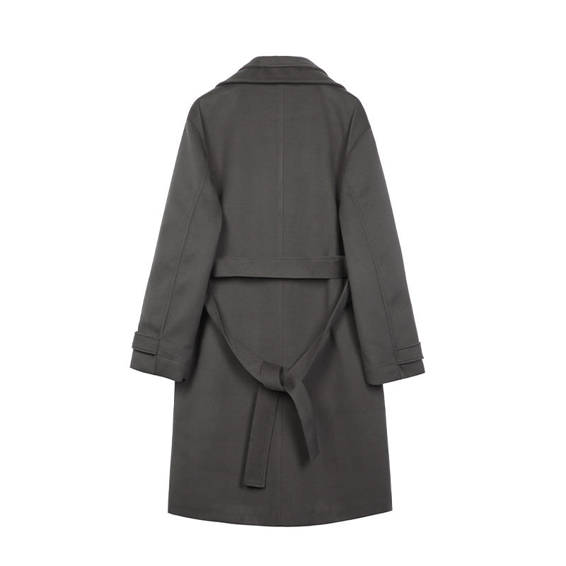 Gray double-breasted trench coat, back view, with waist tie belt and notched collar