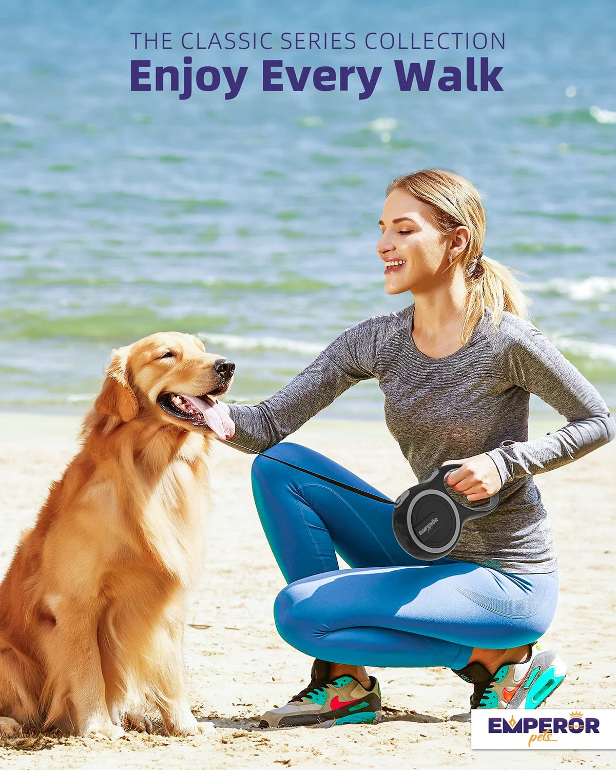 Gray retractable dog leash held by a woman beside a dog