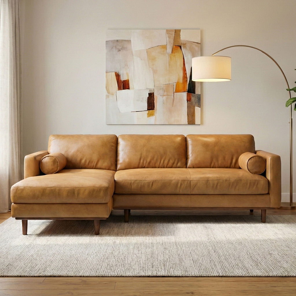 Brown upholstered sectional sofa with chaise and rounded bolster-style cushions