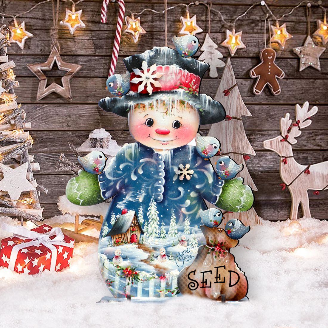 Freestanding Christmas yard sign snowman with birds, hat band, and 'SEED' label