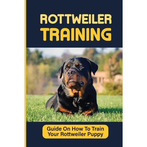 Rottweiler puppy training paperback with black-and-tan puppy on grass and yellow title text