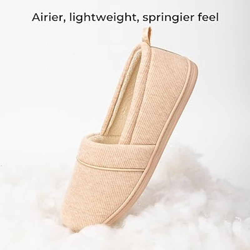 Tan slip-on loafer slippers with tall sock-like collar and rounded toe