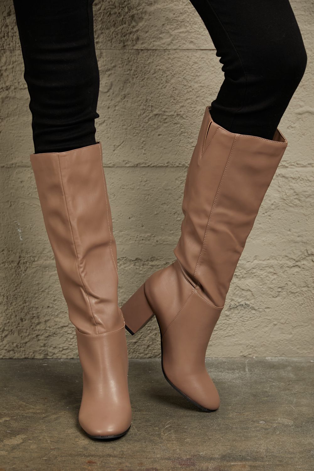 Mocha knee-high block heel boots, angled view, smooth leather-look finish