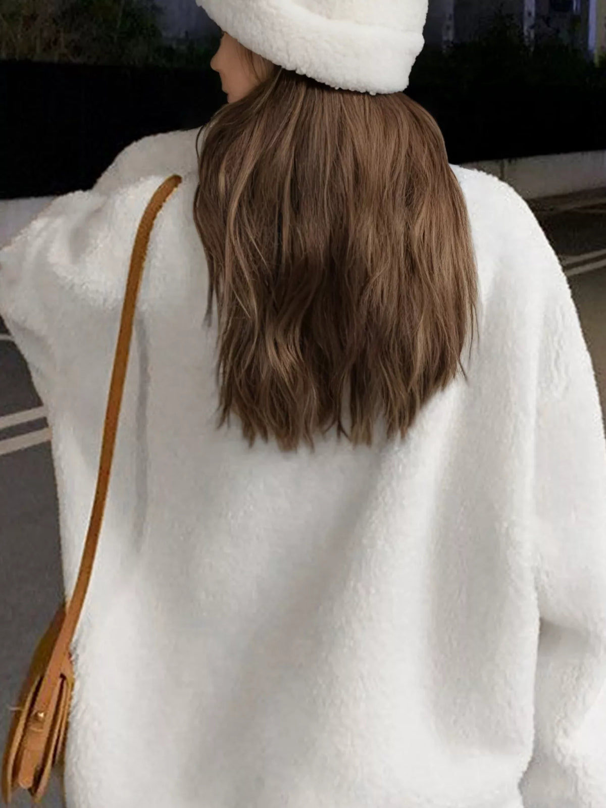 White sherpa fleece zip-up jacket back view with stand collar and small logo patch