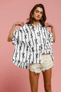 Off-white and black printed button-down shirt with short sleeves and front buttons