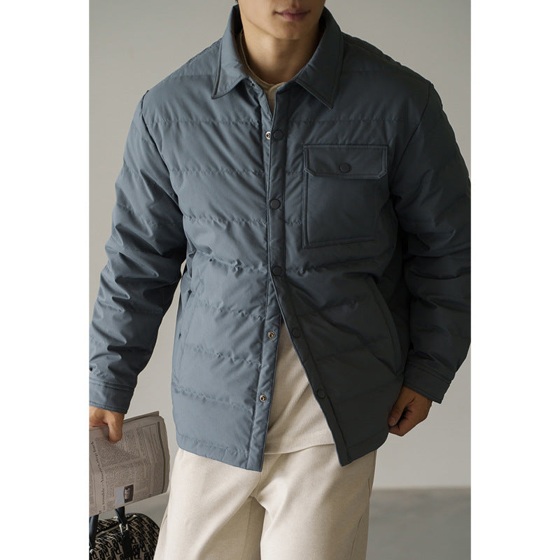 Men's short puffer jacket in gray with baseball collar, padded front, and chest pocket