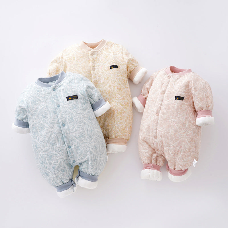 Three newborn cotton footed onesies, light blue, cream, and pink, snap front