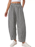 Black gingham wide-leg pants with elastic waist and loose ankle-length fit