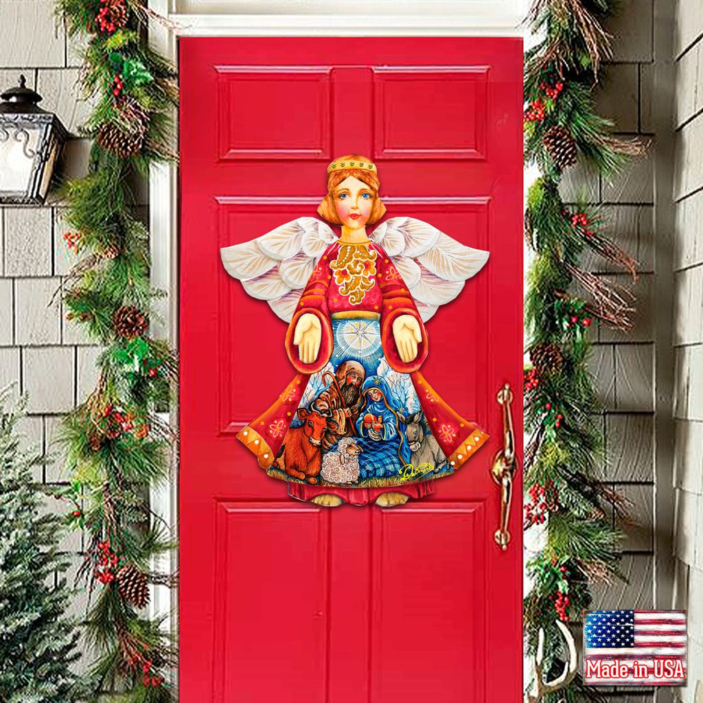 Nativity angel door decor with white feathered wings, red robe, rings over nativity scene