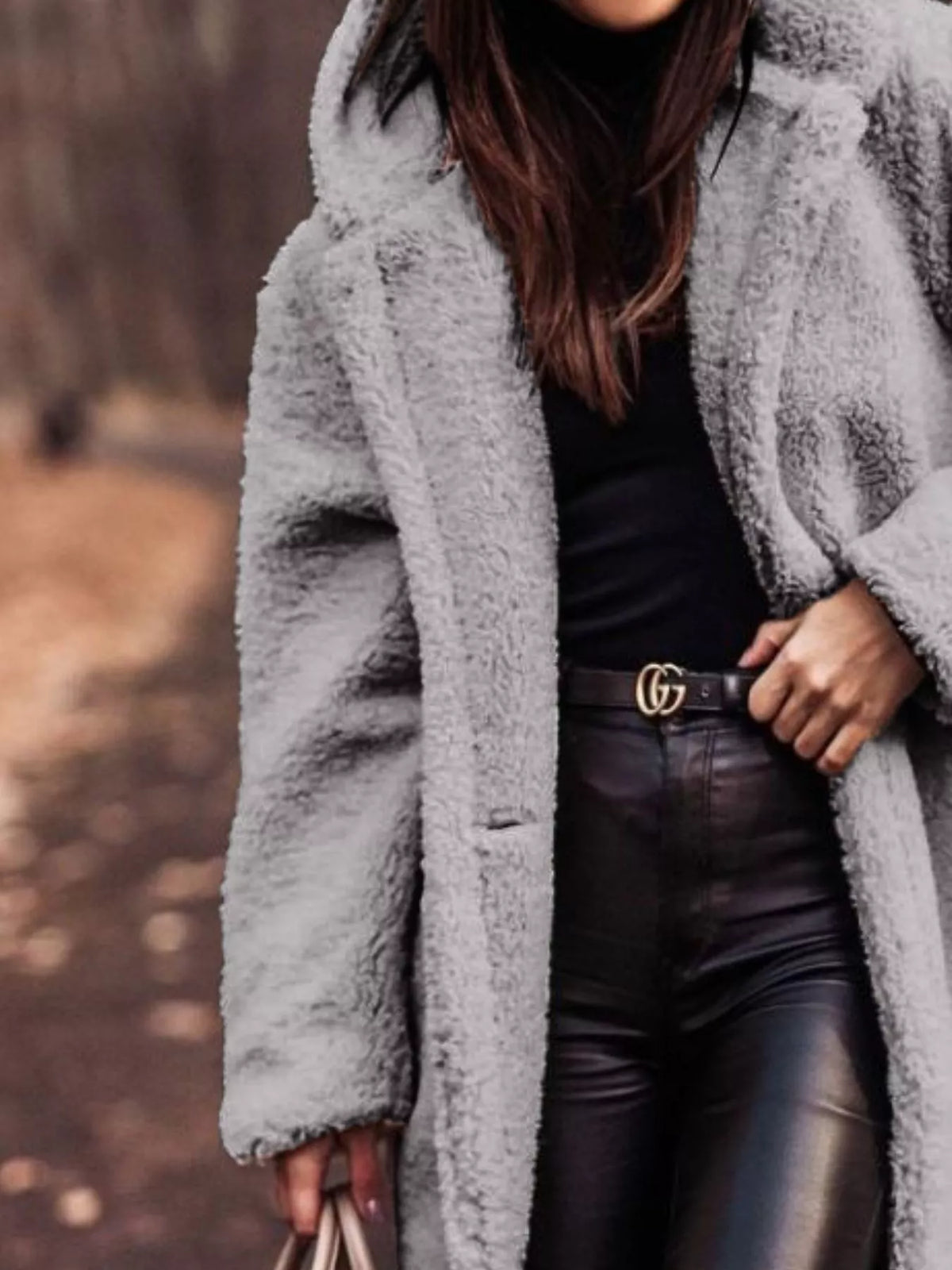 Light gray plush hooded longline coat with relaxed sleeves and button closure