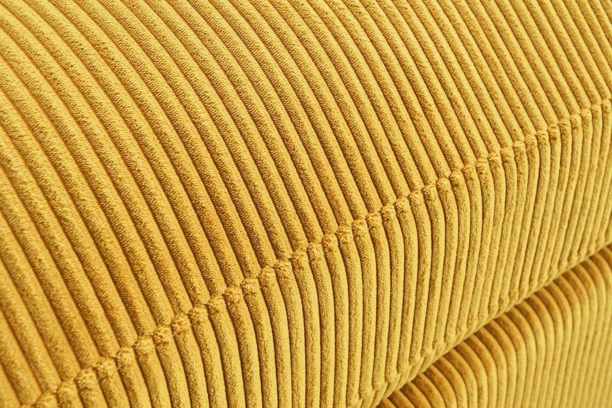 Mustard yellow corduroy-style sectional sofa chaise with plush striped upholstery