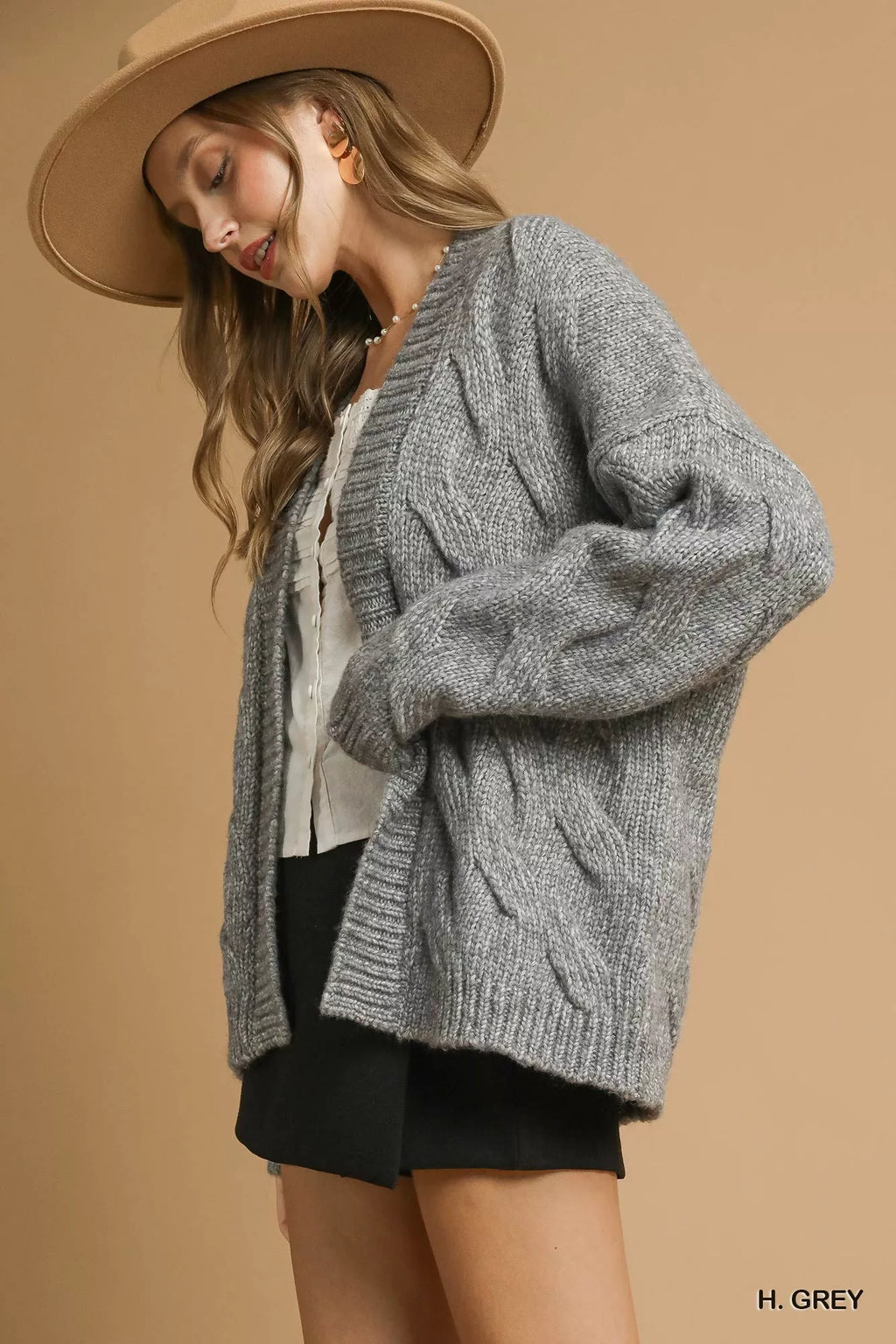 Grey chunky cable-knit open-front cardigan with ribbed hem and long sleeves