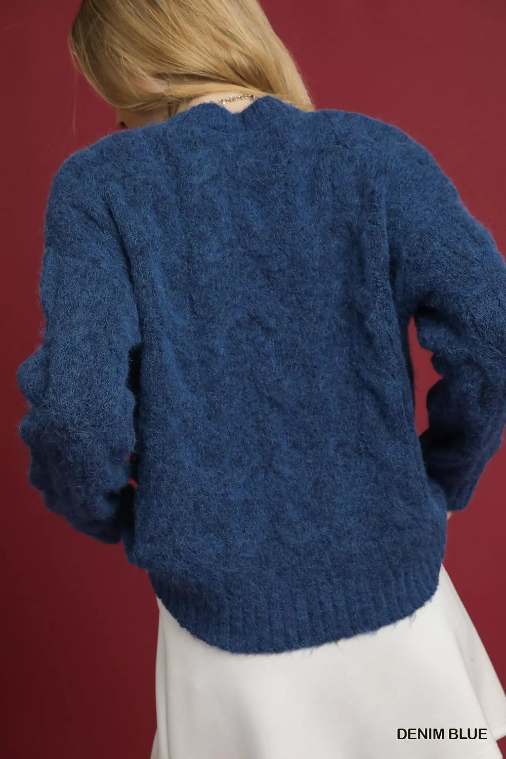 Denim blue cable knit sweater back view with long sleeves