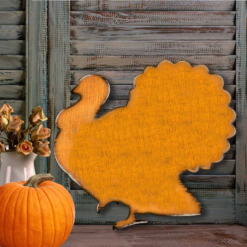 Orange wooden turkey door hanger with woodgrain finish and scalloped border