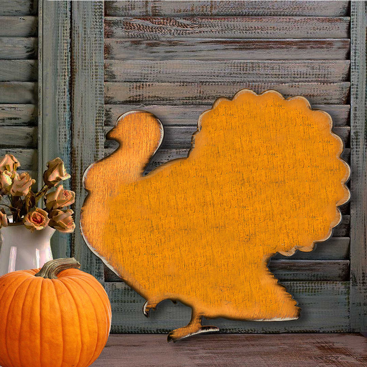 Orange wooden turkey door hanger with woodgrain finish and scalloped border