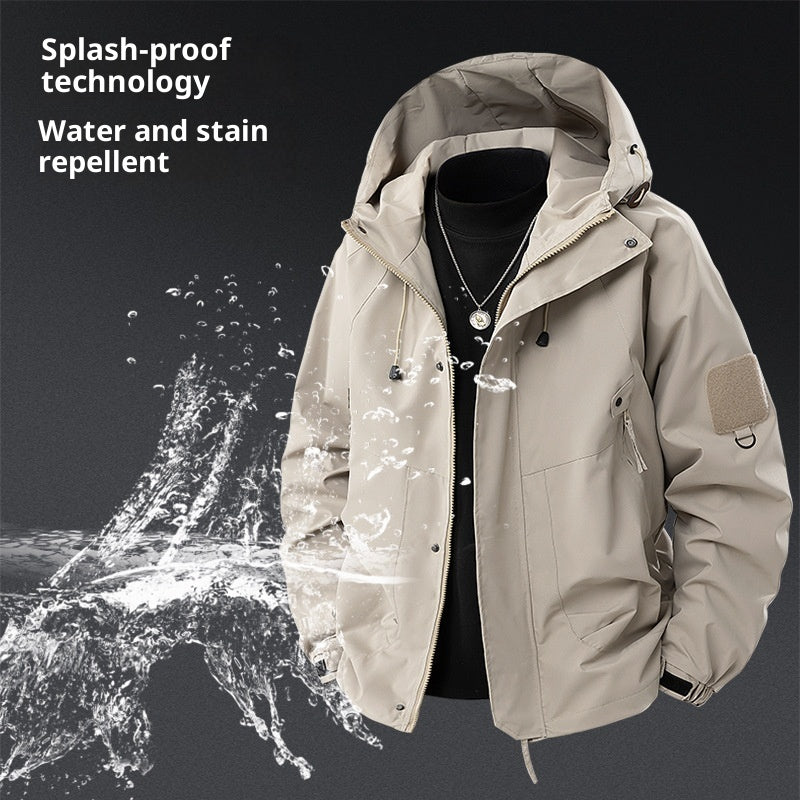 Hooded waterproof cargo jacket, light gray with zip front, flap pockets, adjustable cuffs.