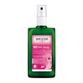 Weleda Wild Rose 24H deodorant spray bottle with pink wild rose label