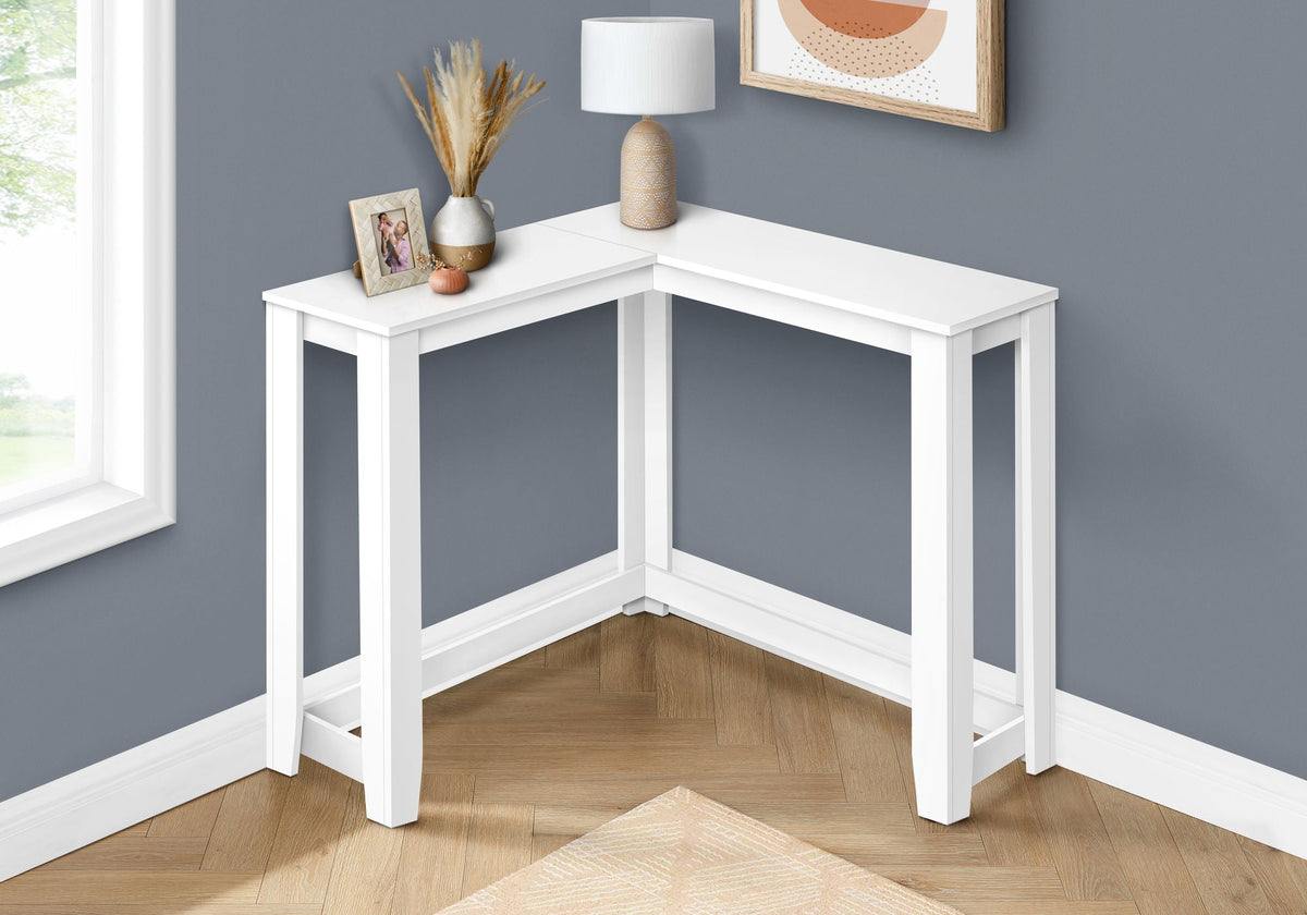 Corner accent console table in white finish with squared legs and open corner frame.