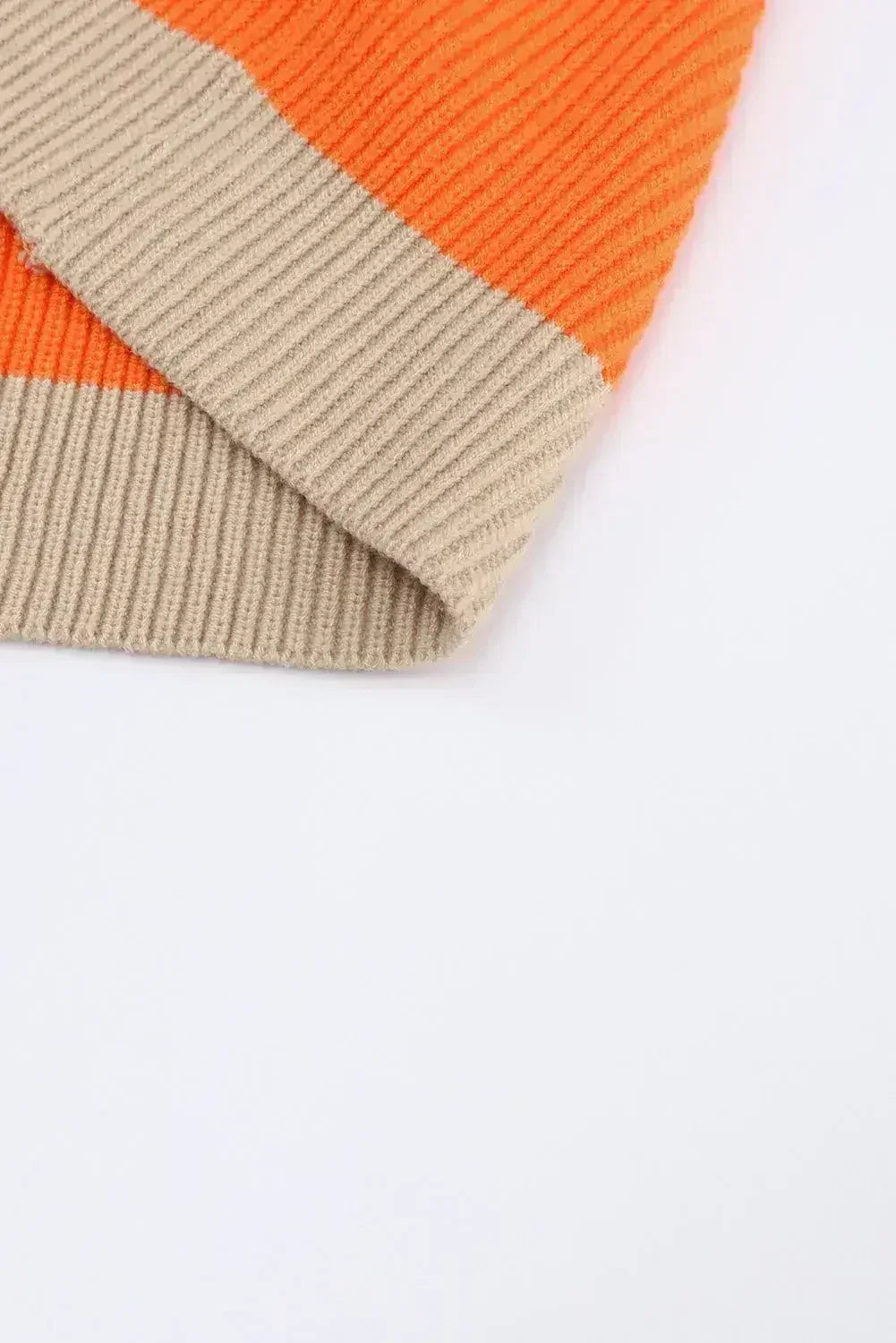 Ribbed knit cardigan hem with orange and beige colorblock stripes