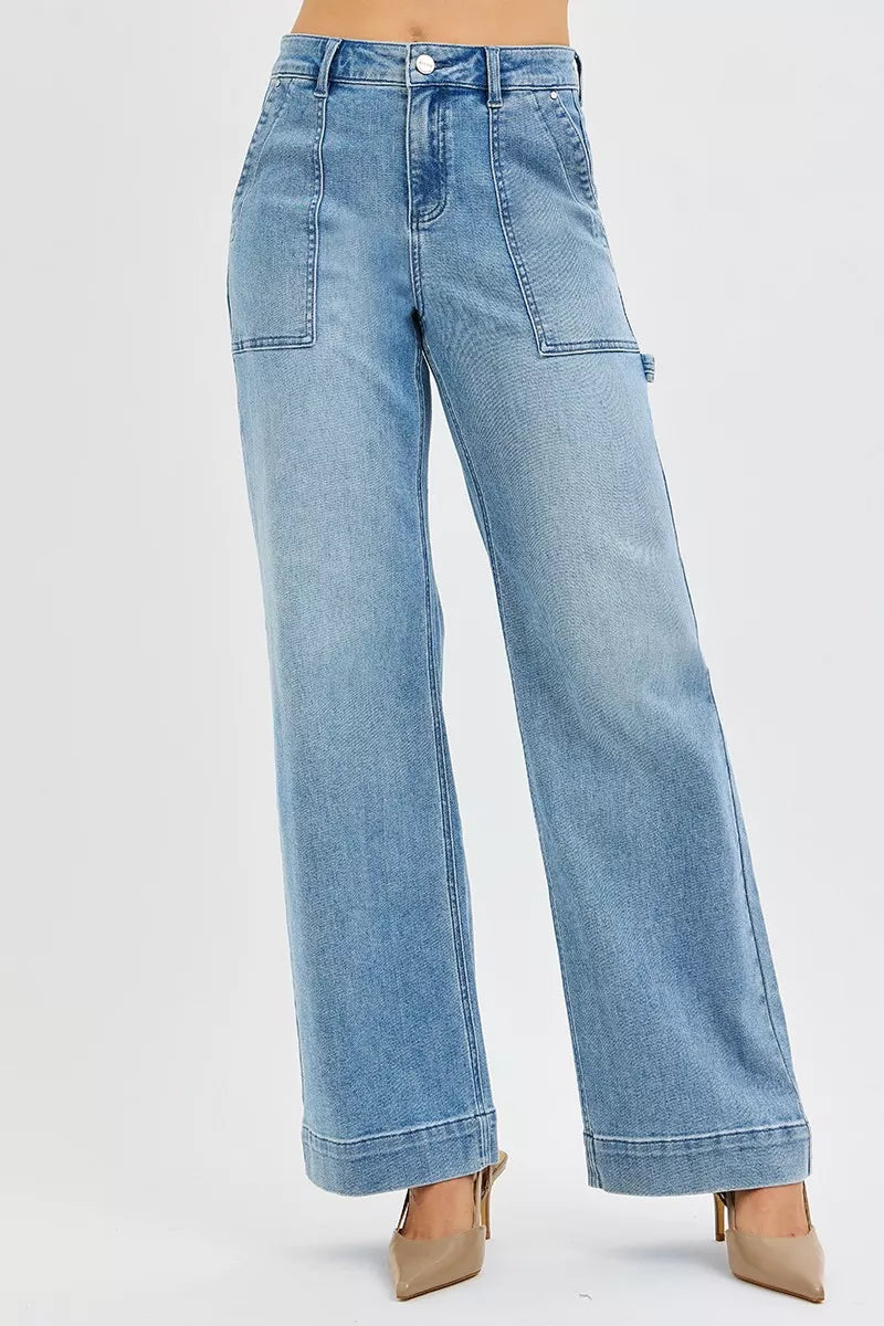 Medium wash high-rise straight-leg jeans with front pockets and belt loops