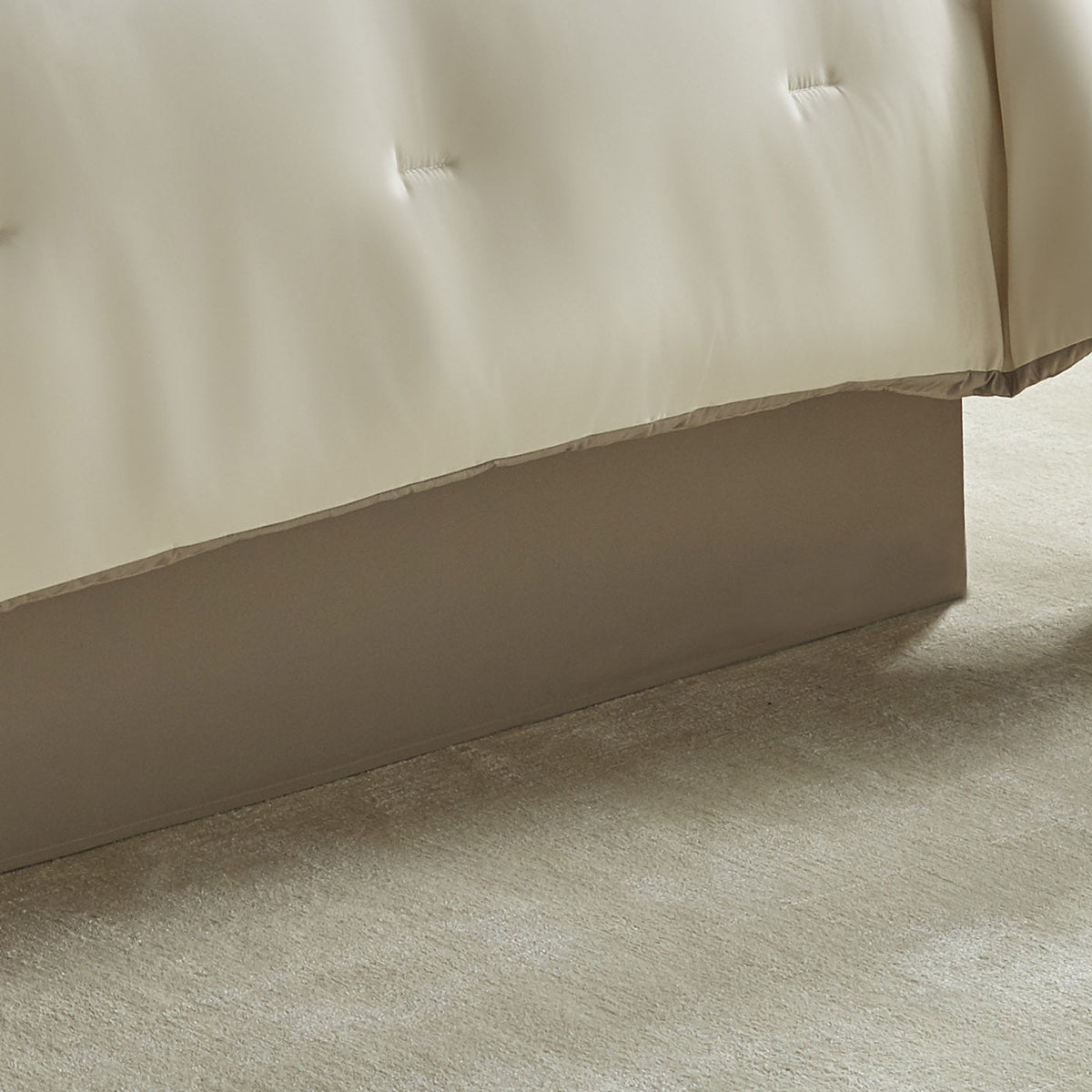 Ivory comforter panel with smooth fabric drape and tailored lower edge
