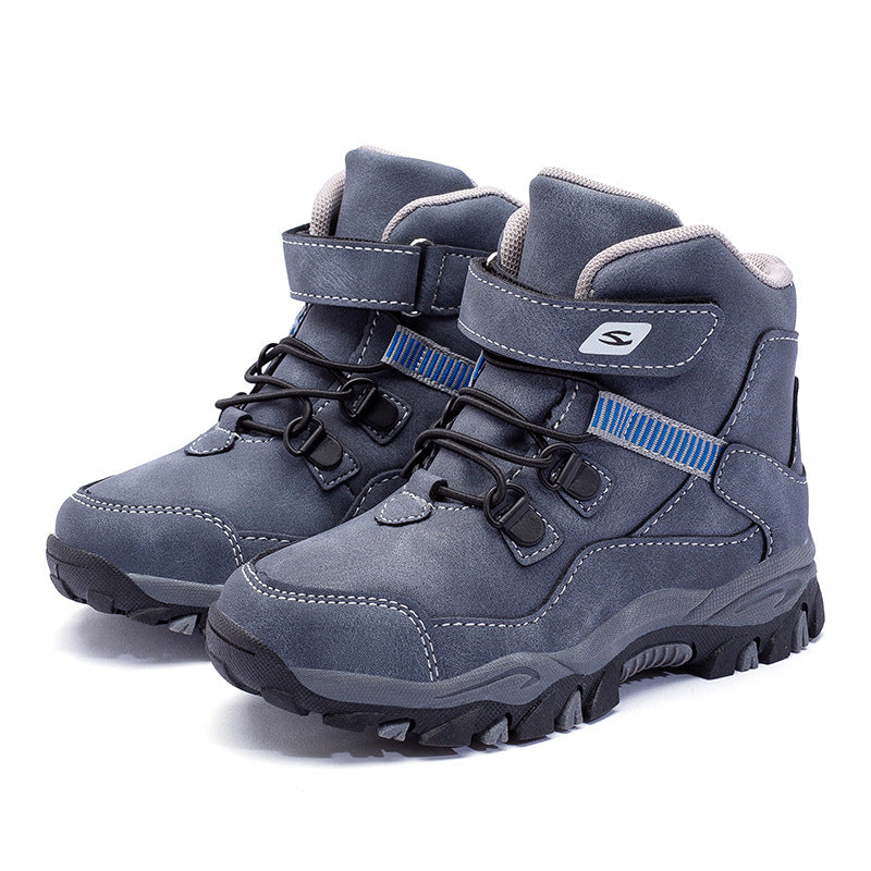 Navy kids winter boots with faux-fur lining, lace-up front, side buckle straps, chunky tread sole