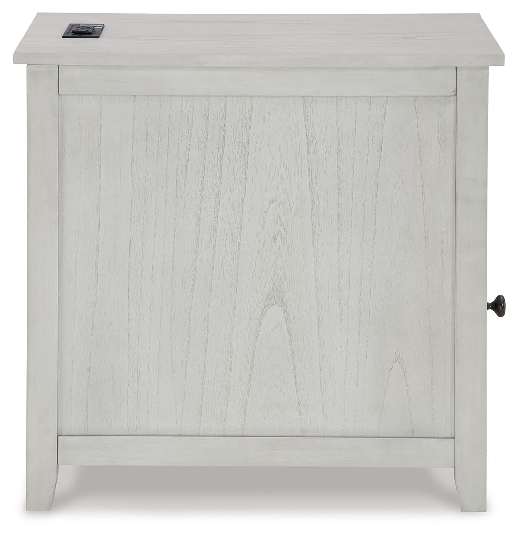 Light beige chairside end table with cabinet door and metal pull handle