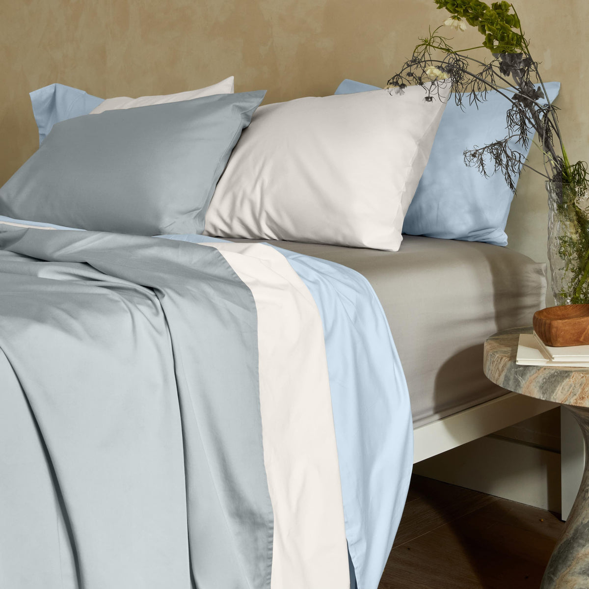 Light blue and white sateen bedding set with duvet and coordinated pillowcases