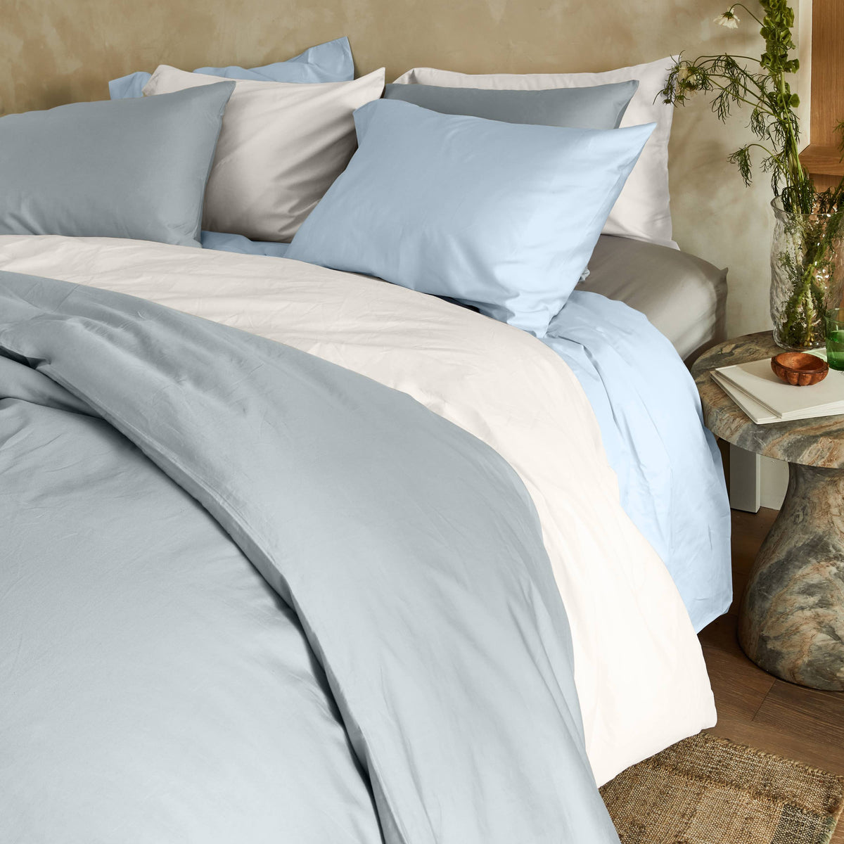 Light blue and white sateen bedding set with duvet and pillowcases