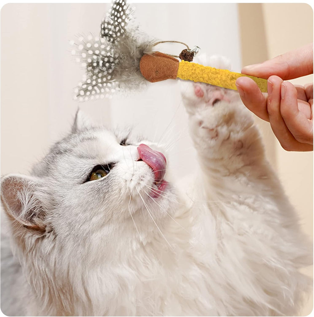 Cat chew stick toy with yellow textured wand, brown felt tip, and gray feather sprig