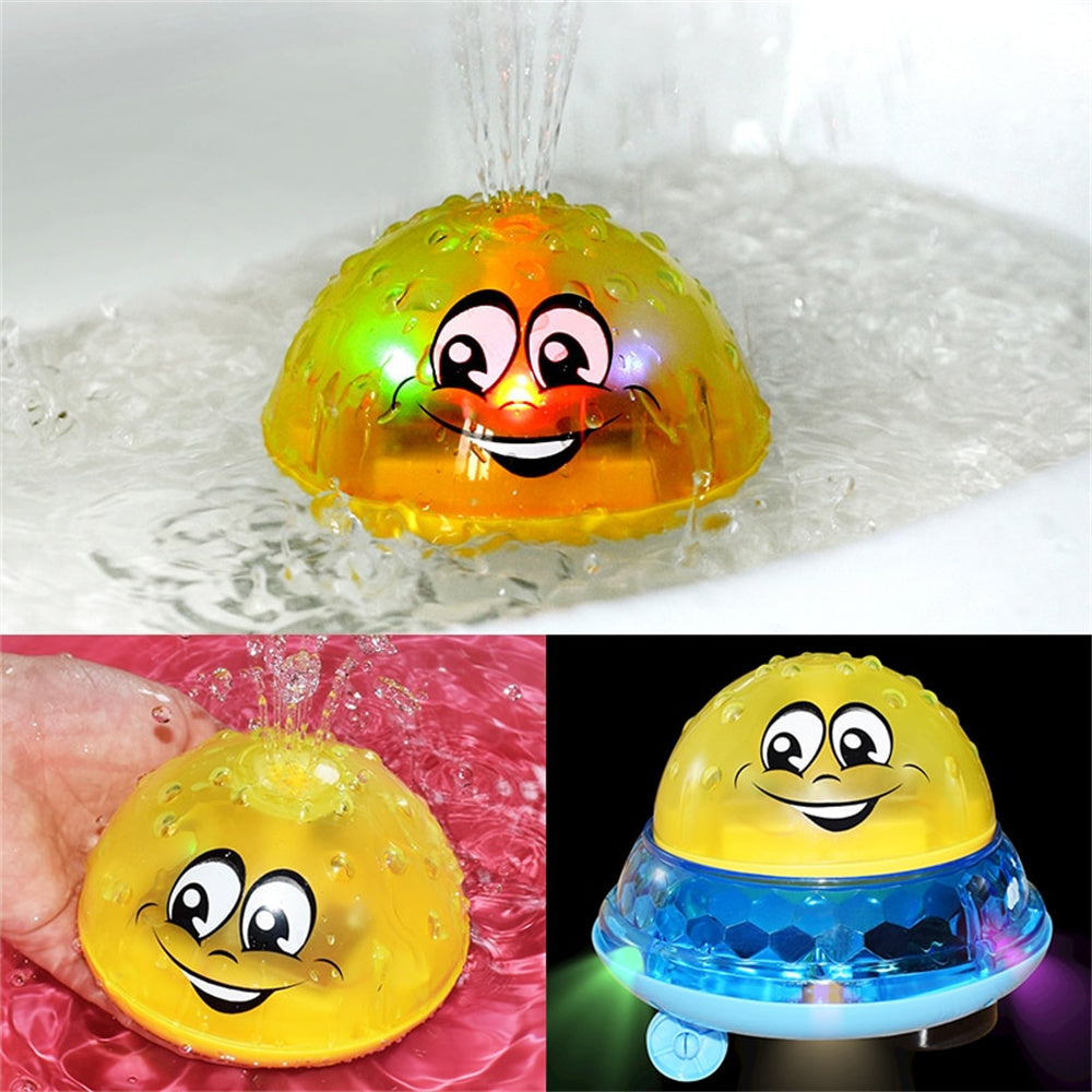 Yellow UFO water sprinkler toy with smiling face, water spraying in pool