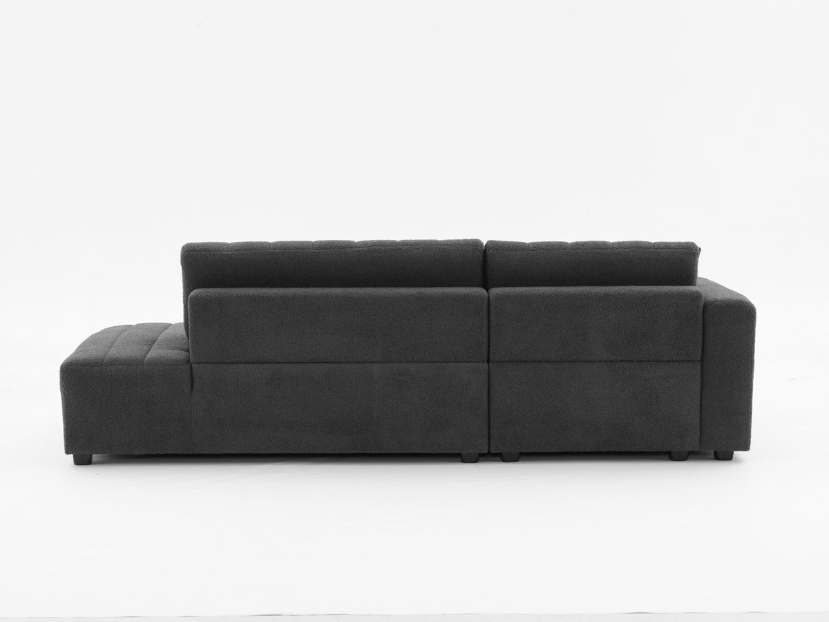 Dark gray upholstered sectional sofa with padded back and seat cushions