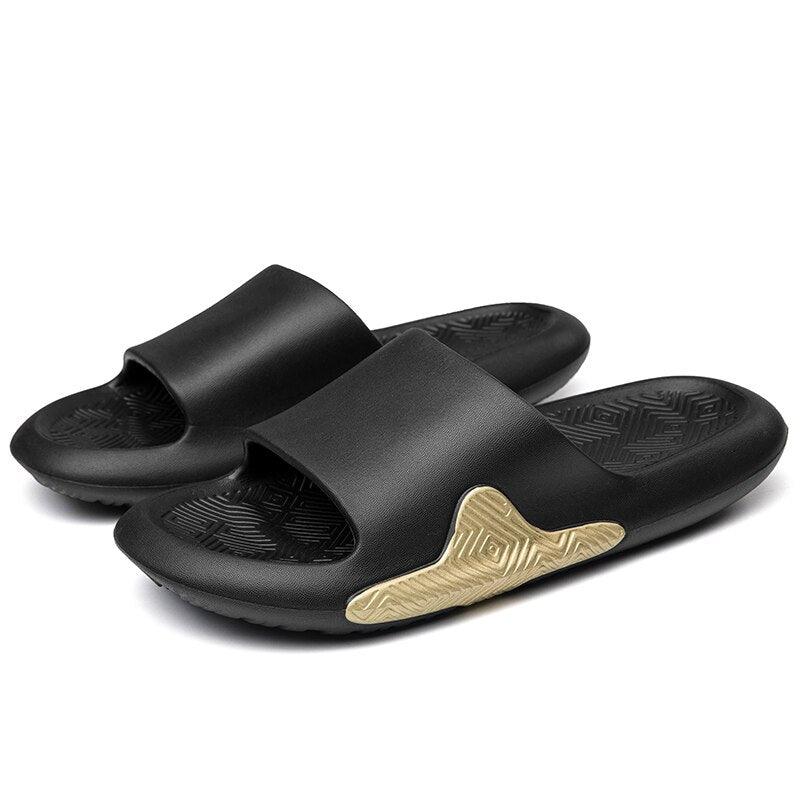 Men’s EVA slide sandals, black with gold patterned midsole and grippy textured outsole