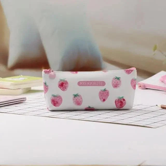 Small white pencil pouch with pink strawberry pattern and zip top