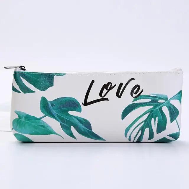 White pencil case pouch with teal tropical leaf print and "Love" graphic