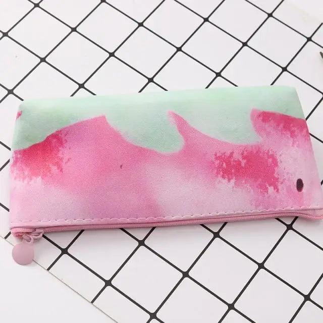 Pink watercolor-style strawberry pencil pouch with rounded pom accessory