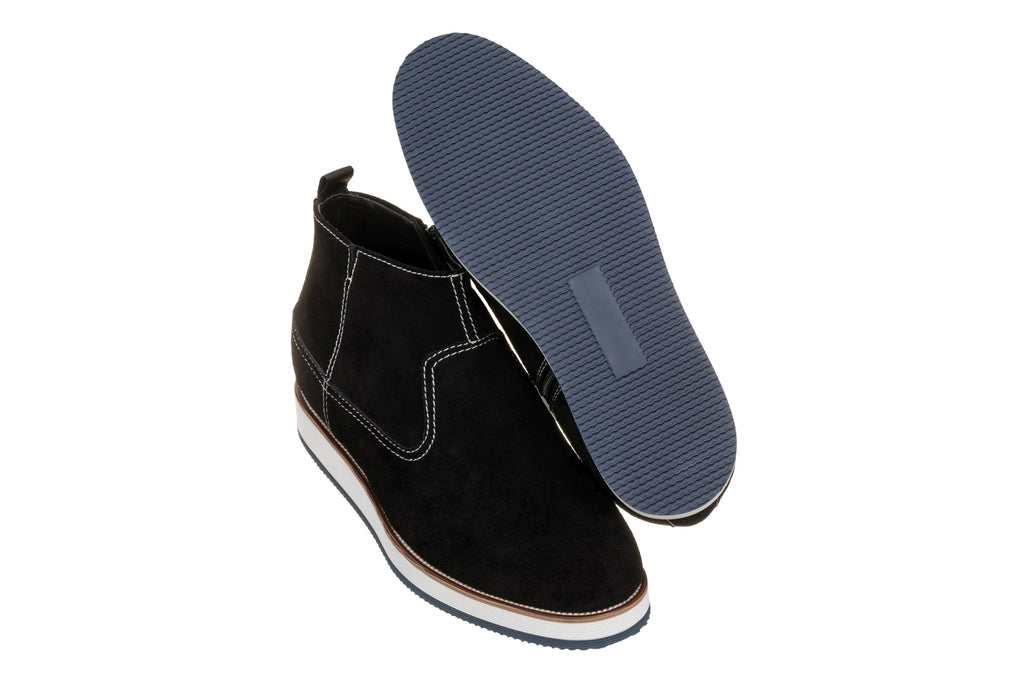 Black nubuck zipper boots with textured outsole and contrast midsole stripe