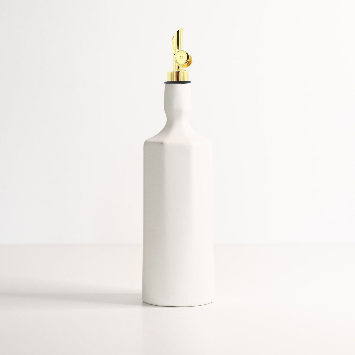 Silk white porcelain olive oil dispenser with gold pump and thin nozzle
