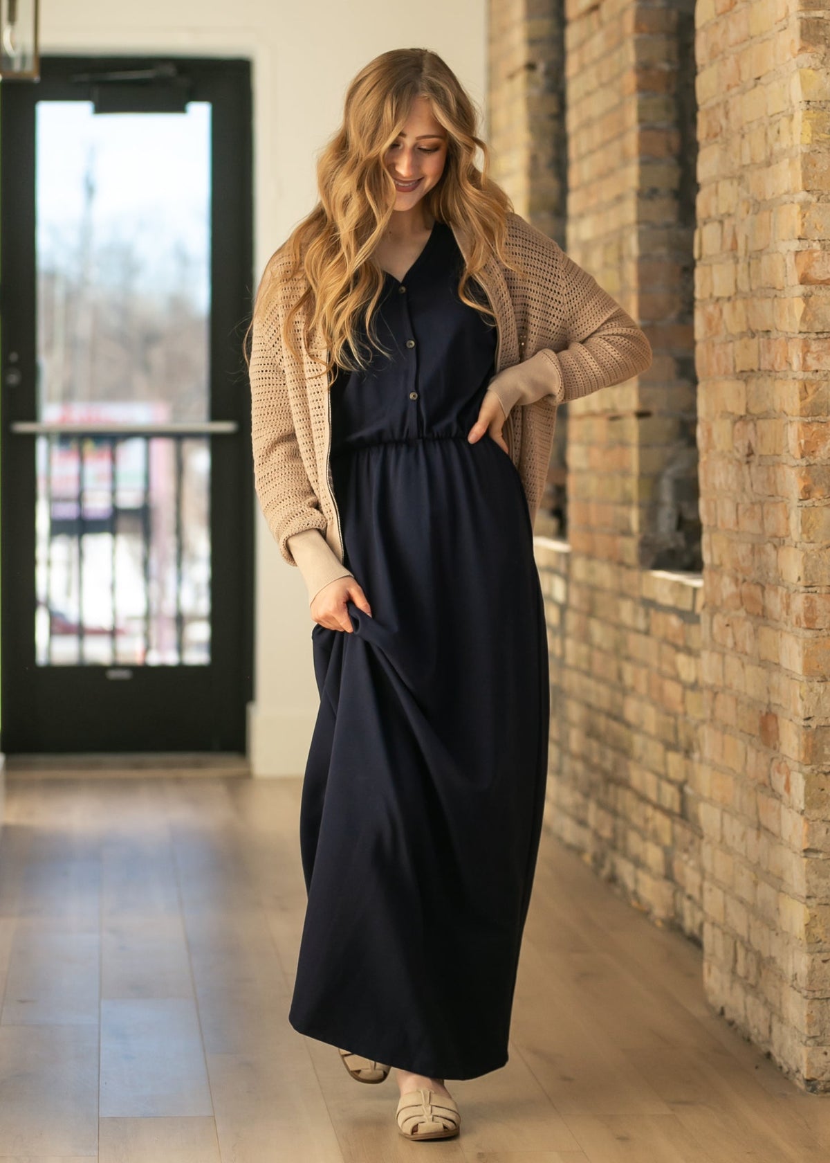 Navy button-front maxi dress with cinched waist and short sleeves