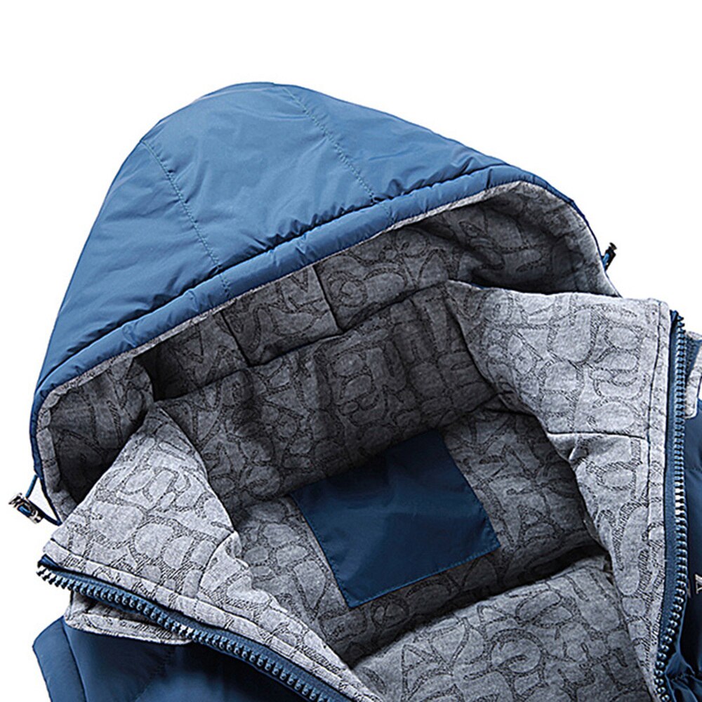 Blue sleeveless hooded puffer vest with gray patterned inner lining and zipper