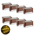 Brown solar step lights set with warm LED glow, multiple mounted units