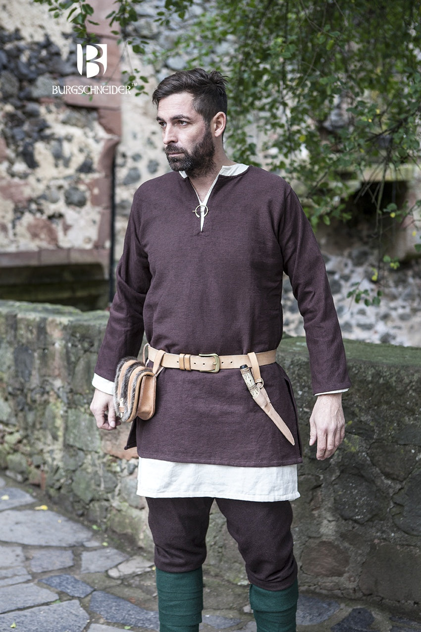 Dark brown short tunic with long sleeves, V-neck tie, layered hem, and leather belt