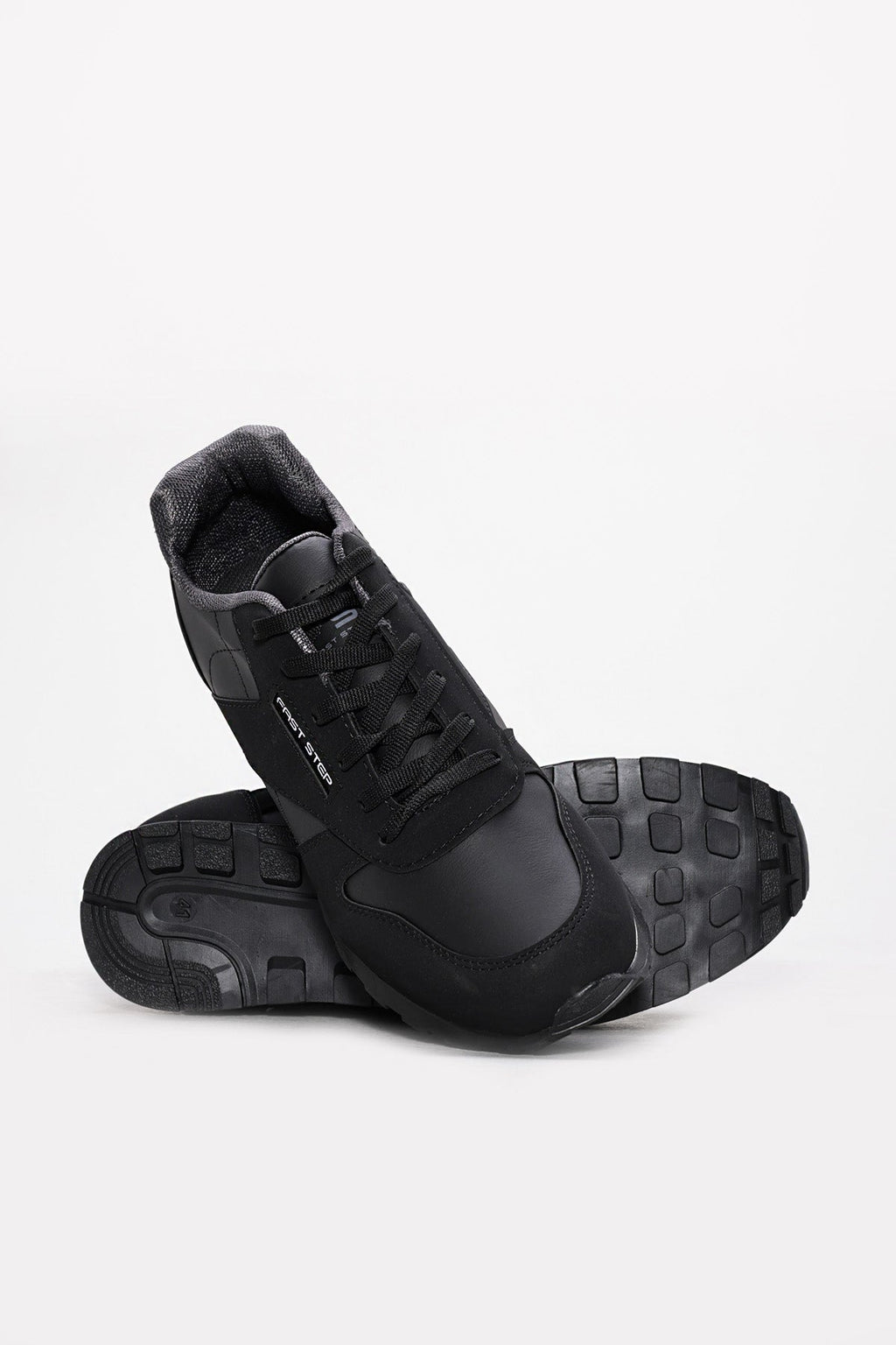 Black lace-up sneakers with rugged outsole, side and sole view